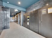 Thumbnail 15 of 35 - a row of stainless steel lockers in a hallway of a building