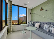 Thumbnail 35 of 35 - a living room with a couch and two tables