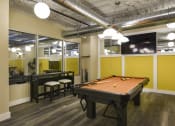Thumbnail 25 of 80 - a game room with a pool table and a tv
