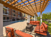 Thumbnail 34 of 80 - our apartments offer a pool and covered patio
