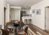 Thumbnail 53 of 80 - a kitchen and dining room with a table and chairs