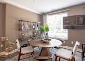 Thumbnail 48 of 53 - Dining room with round table and industrial shelving at Inwood at Renaissance Square Apartments, New Jersey