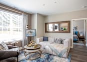 Thumbnail 36 of 53 - Living room with large mirror and view into bedroom at Inwood at Renaissance Square Apartments, Marlton, NJ 08053