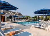 Thumbnail 1 of 44 - Expansive Outdoor Courtyard with Pool and Lounge Seating