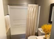 Thumbnail 6 of 11 - Modern renovated bathroom with updated fixtures in a 2-bedroom apartment at Lynnhaven Landing in Virginia Beach