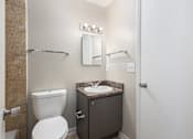Thumbnail 14 of 14 - a bathroom with a toilet sink and mirror and a shower