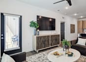 Thumbnail 41 of 46 - Living Area With Kitchen at The Liliana Apartment Homes, Pooler Georgia