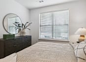 Thumbnail 39 of 46 - Bedroom With Expansive Windows at The Liliana Apartment Homes, Pooler