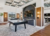 Thumbnail 25 of 46 - Clubhouse With Billiards Table at The Liliana Apartment Homes, Pooler, Georgia