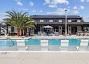 Thumbnail 1 of 46 - Pool With Sundecks at The Liliana Apartment Homes, Pooler
