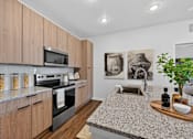 Thumbnail 9 of 39 - Modern Kitchen at The Landing at Lemay Apartments, Fort Collins, Colorado