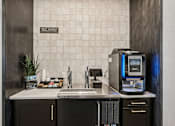 Thumbnail 52 of 57 - A bathroom with a toilet, sink, and a computer at The Stadler Luxury Apartments, Florida 34210