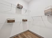 Thumbnail 42 of 43 - A white room with shelves and boxes on them at The Hadley - North Port, FL Apartments, Florida, 34287