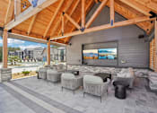 Thumbnail 36 of 105 - Outdoor Lounge With TV at The Pullman Luxury Apartments, Atlanta, Georgia