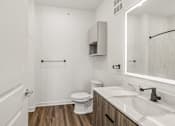 Thumbnail 86 of 124 - Bathroom with soaking tub and woodstyle flooring at Velara Luxury Apartments, Ponte Vedra Beach