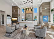 Thumbnail 96 of 124 - Leasing office lobby with reception desk and seating at Velara Luxury Apartments, Ponte Vedra Beach, Florida