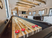 Thumbnail 32 of 45 - a shuffleboard table in the middle of a game room at The BLVD at Wilson Crossings, Wyoming