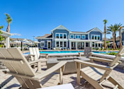 Thumbnail 100 of 124 - Poolside fire pit lounge with adirondack chairs at Velara Luxury Apartments, Ponte Vedra Beach, FL 32081