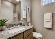 Thumbnail 18 of 68 - a bathroom with three sinks and three mirrors in it  at Grandstone at Sunrise, Arizona, 85383