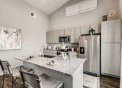 Thumbnail 29 of 68 - Gourmet Kitchen With Island Dining at Grandstone at Sunrise, Arizona