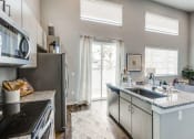 Thumbnail 26 of 68 - Modern Kitchen at Grandstone at Sunrise, Peoria, Arizona