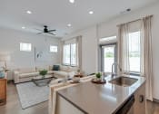 Thumbnail 21 of 32 - Kitchen And Living at The Boardwalk at Tradition, Port St Lucie, FL, 34987