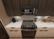 Thumbnail 13 of 19 - Gourmet Kitchen at Heritage on Hover Apartments, Longmont, Colorado