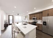 Thumbnail 25 of 45 - Kitchen with Refrigerator at The Union Flats at Fishers District, Fishers, IN, 46037