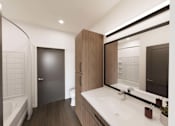 Thumbnail 41 of 45 - Bathroom with sink and mirror at The Union Flats at Fishers District, Fishers, 46037