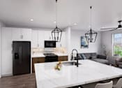 Thumbnail 10 of 21 - A modern kitchen with a large island and a refrigerator at Refinery at Pointe17 Apartments, Arizona, 85085