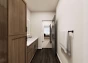 Thumbnail 25 of 48 - A bathroom with a wooden vanity and a mirror.