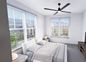 Thumbnail 17 of 21 - A bedroom with a large bed and a flat screen TV at Refinery at Pointe17 Apartments, Phoenix, AZ, 85085