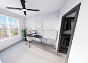 Thumbnail 16 of 21 - A room with a ceiling fan, a bed, and a window overlooking the beach at Refinery at Pointe17 Apartments, Arizona, 85085