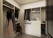 Thumbnail 9 of 35 - A walk in closet with clothes hanging and shelves.