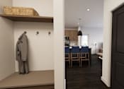 Thumbnail 21 of 35 - A room with a dining table and chairs is visible through an open door.