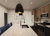 Thumbnail 22 of 35 - A modern kitchen with a marble countertop and dark wood cabinets.