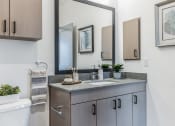 Thumbnail 18 of 31 - a bathroom with a sink and a mirror  at Prism at Diamond Ridge, Pennsylvania, 15108