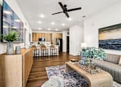 Thumbnail 6 of 124 - Open living and dining space with wood flooring at Velara Luxury Apartments, Ponte Vedra Beach