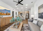 Thumbnail 44 of 124 - Open living area with kitchen and modern furnishings at Velara Luxury Apartments, Florida, 32081