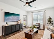 Thumbnail 47 of 105 - Living Room With Ceiling Fan at The Pullman Luxury Apartments, Atlanta