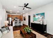 Thumbnail 59 of 105 - Living Room With Kitchen at The Pullman Luxury Apartments, Atlanta, Georgia