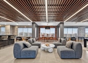 Thumbnail 22 of 32 - Clubhouse with Chairs at Refinery at Pointe17 Apartments, Phoenix, AZ