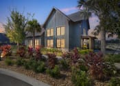 Thumbnail 1 of 30 - a home with a landscaped garden in front of it at Canter, Ocala