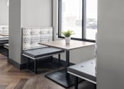 Thumbnail 18 of 46 - a dining room with tables and a window at Alta25, Monument, 80132
