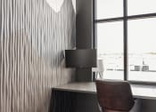 Thumbnail 31 of 46 - a workspace with a desk and a chair and a window at Alta25, Monument