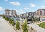 Thumbnail 33 of 59 - Apartment building with swimming pool at The Quarry Luxury Apartment Homes, Colorado, 80526