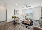 Thumbnail 10 of 59 - a living room with a couch and a coffee table at The Quarry Luxury Apartment Homes, Fort Collins, 80526