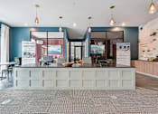 Thumbnail 24 of 59 - a bar in the lobby at The Quarry Luxury Apartment Homes, Fort Collins