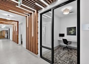 Thumbnail 30 of 32 - A hallway with a sign at Refinery at Pointe17 Apartments, Phoenix, AZ, 85085
