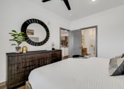 Thumbnail 9 of 31 - a bedroom with a large bed and a wooden dresser  at Prism at Diamond Ridge, Pennsylvania, 15108